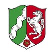 Auf dem Bild ist das Wappen des Bundeslandes Nordrhein-Westfalen zu sehen.